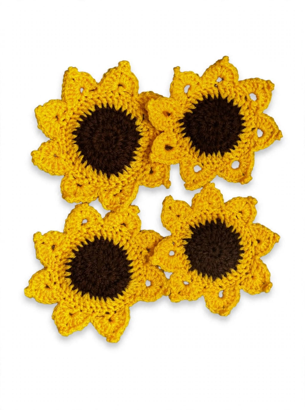 Set of 4 crochet sunflower coasters arranged together