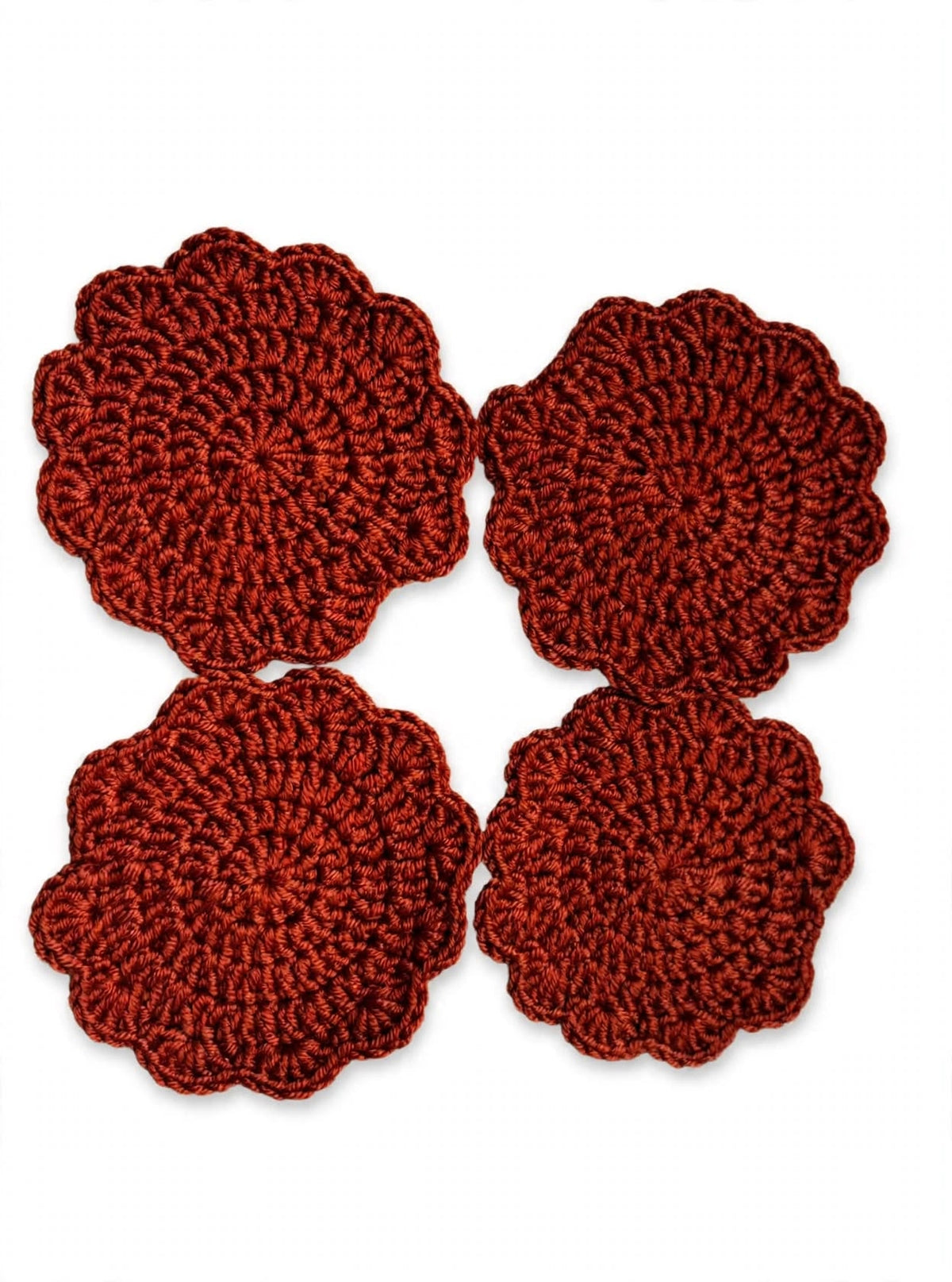 Set of 4 handmade crochet flower coasters in deep rusty brick red with scalloped petal edges