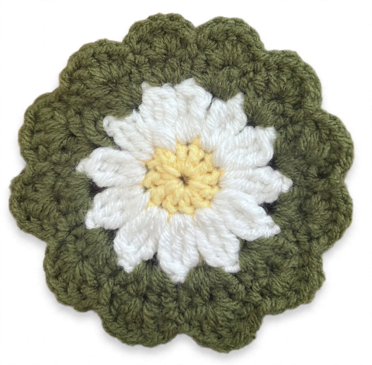 Handcrafted olive green crochet daisy coaster with white petals and yellow centre