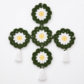 Handmade crochet daisy wall hanging natural product photography
